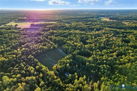 an aerial view of residential building with outdoor space