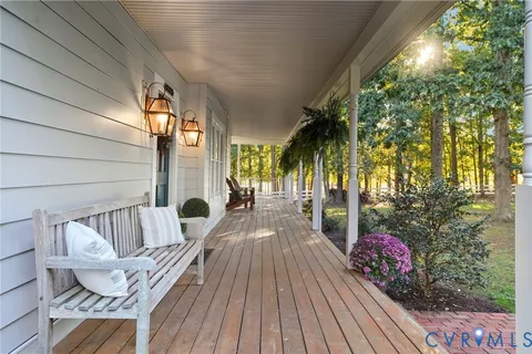 a view of balcony with furniture
