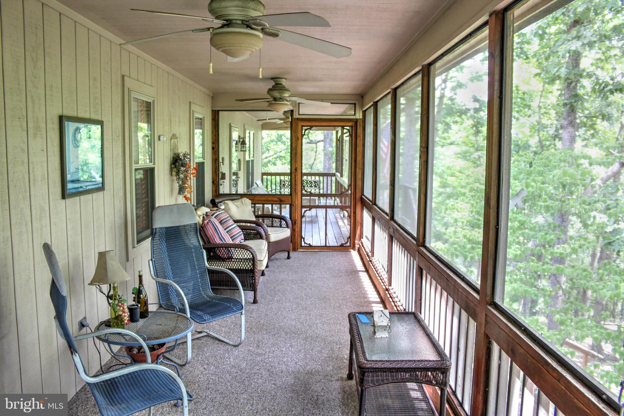 36 Ewells Rdg Road Basye, VA 22810 - Photo 12 of 53 Partially screened front porch