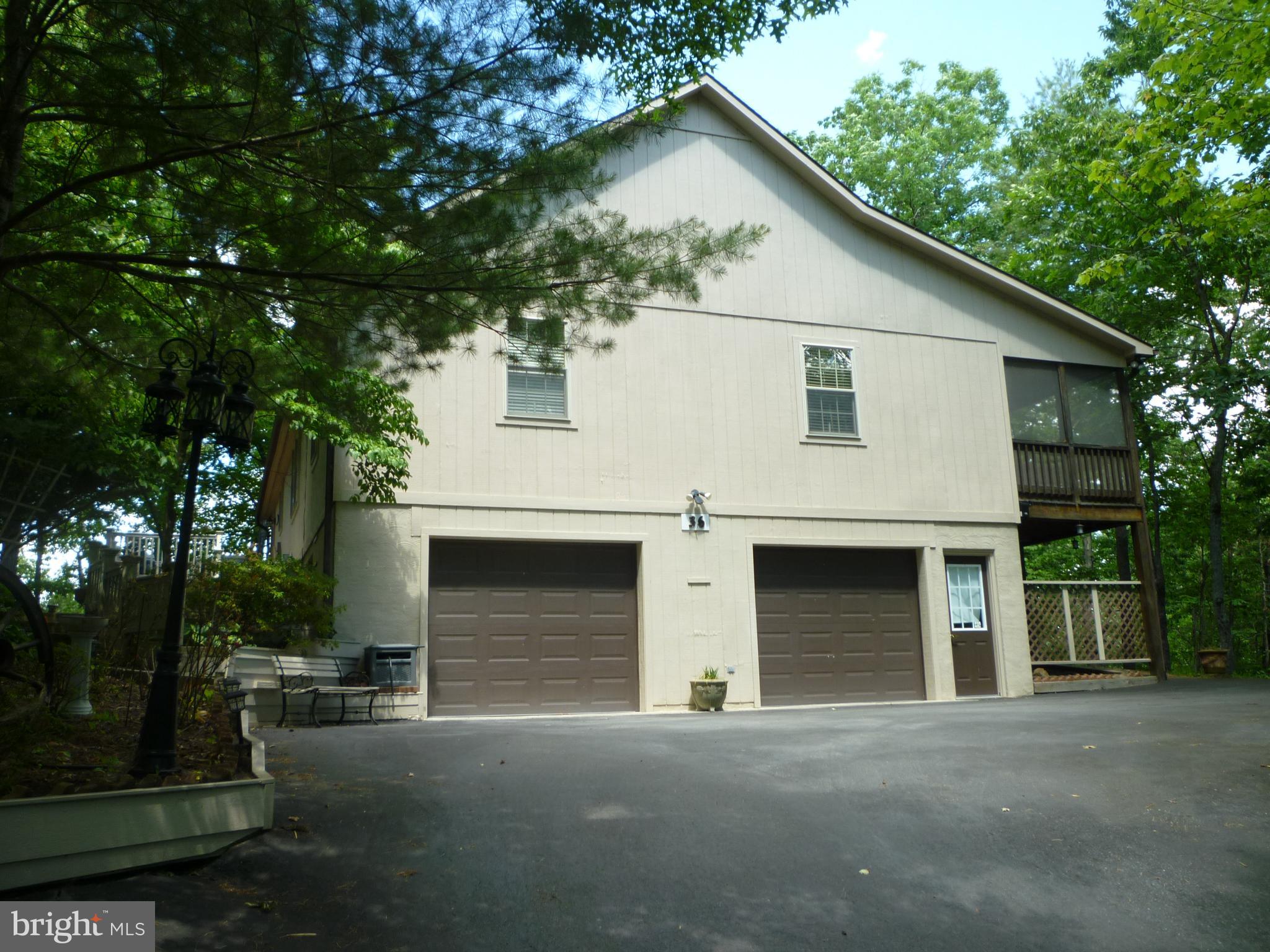 36 Ewells Rdg Road Basye, VA 22810 - Photo 45 of 53 Garage Entrance with Asphalt Driveway and parking