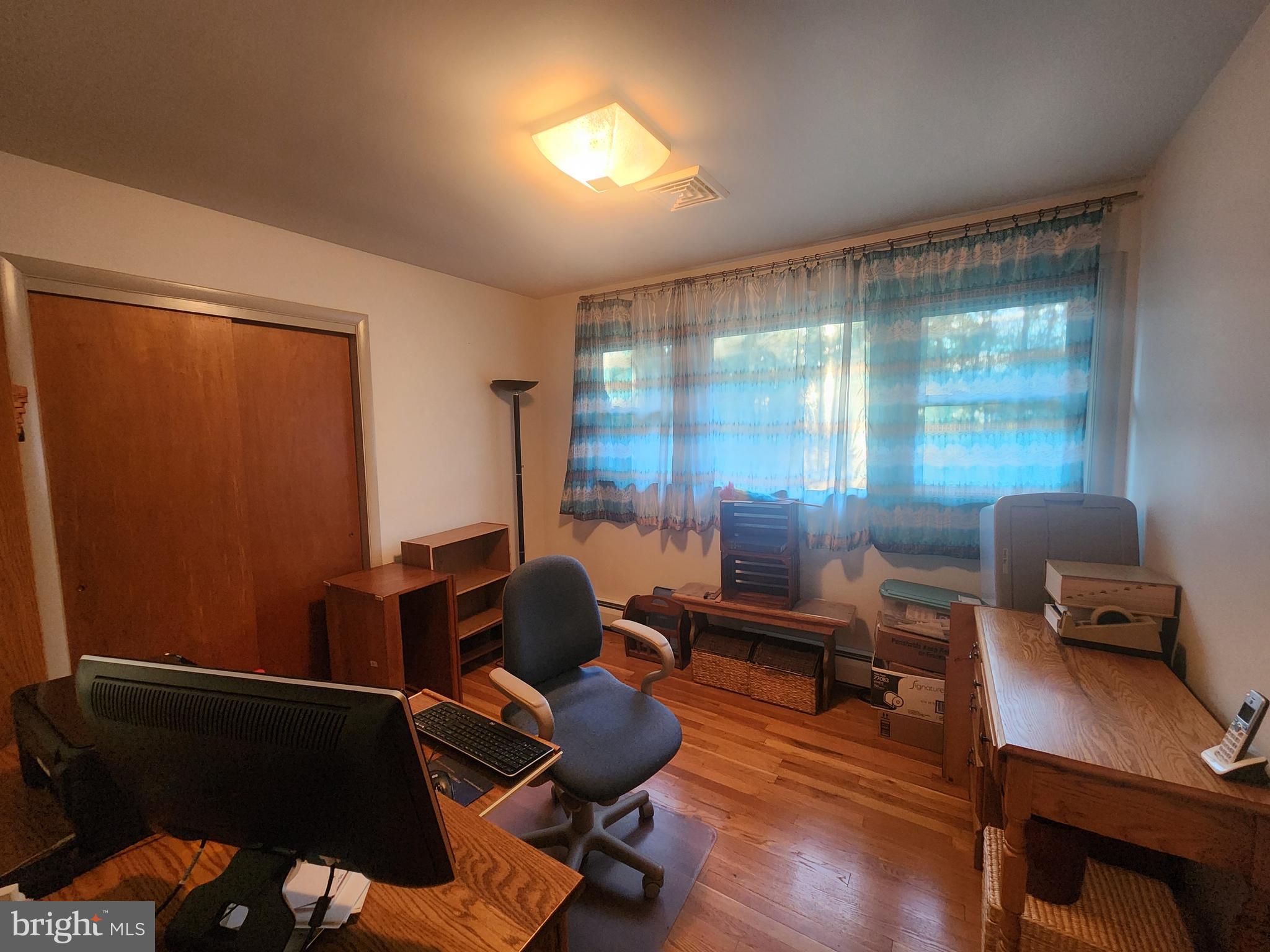 5640 Elizabethtown Road Manheim, PA 17545 - Photo 17 of 48 a room with furniture and wooden floor