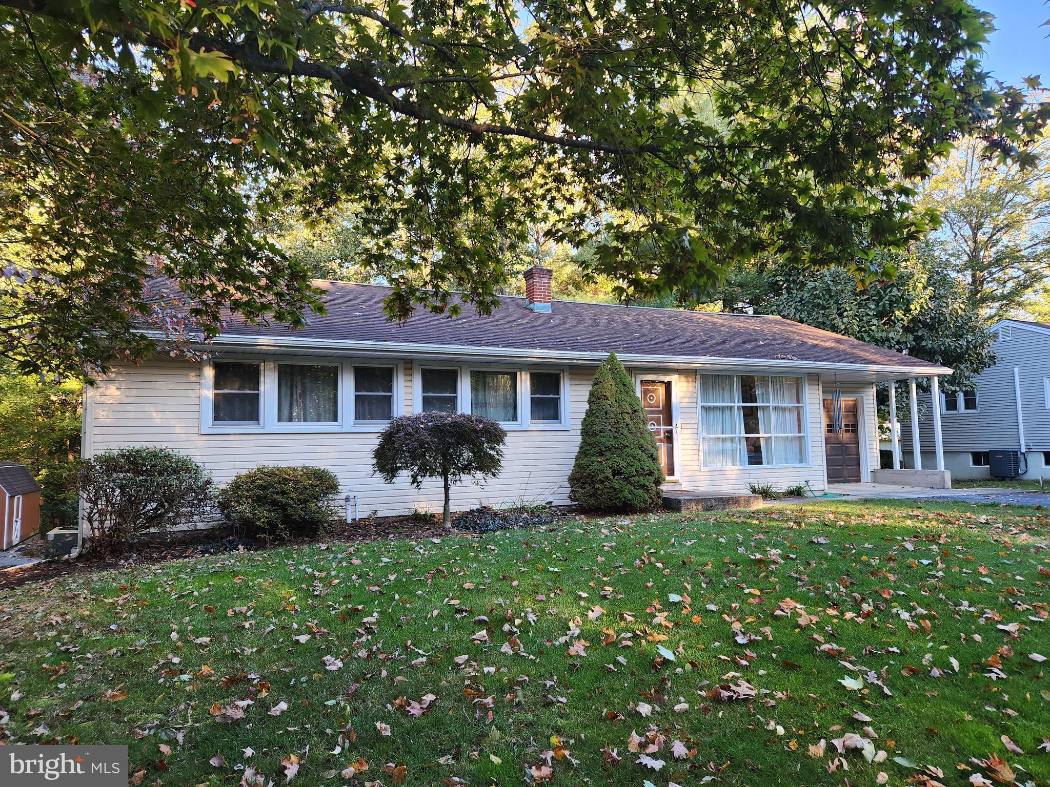 5640 Elizabethtown Road Manheim, PA 17545 - Photo 2 of 48 a front view of a house with a garden