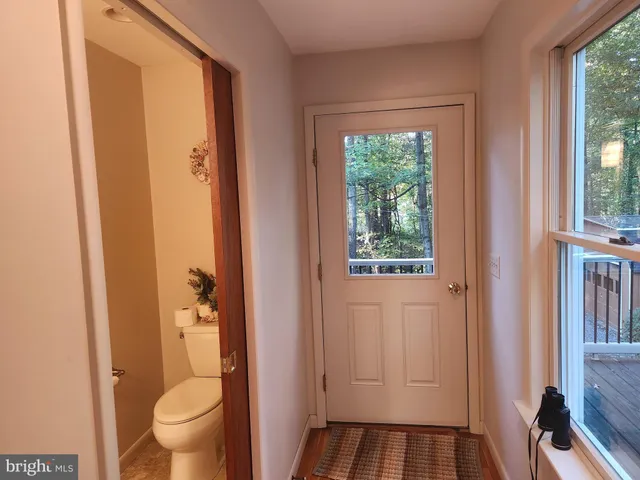 a view of bathroom with a toilet