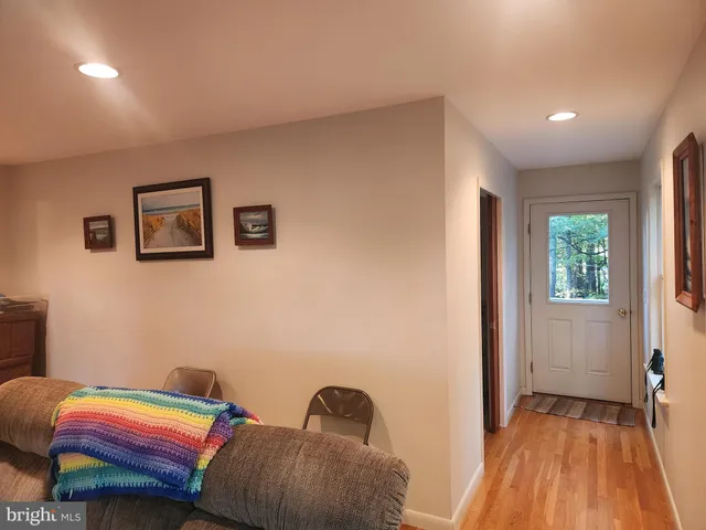 a room with a bed and a window