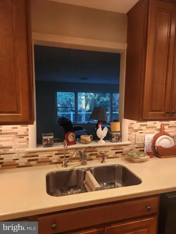 a kitchen sink with a stove