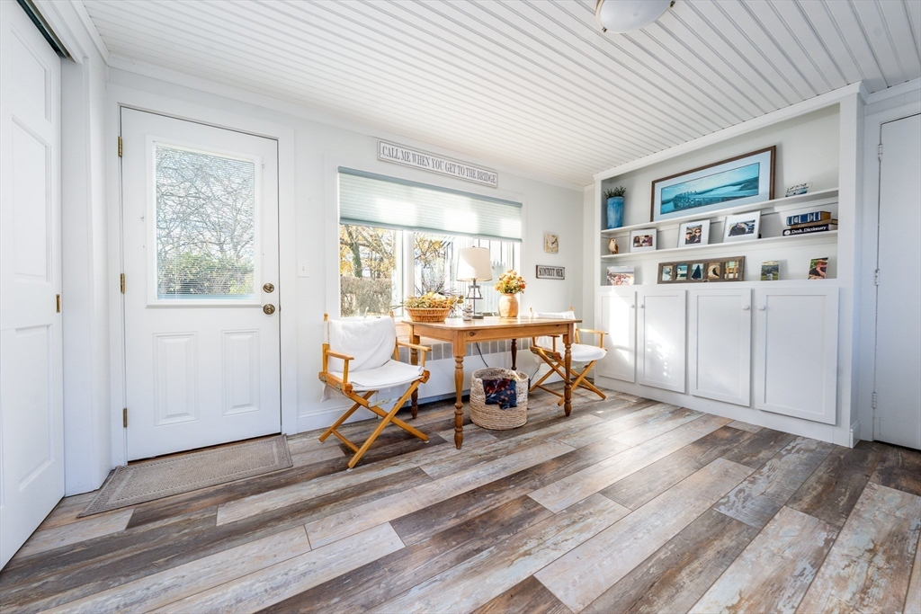 142 Chestnut Street Barnstable, MA 02601 - Photo 27 of 42 a view of a workspace with furniture and a window