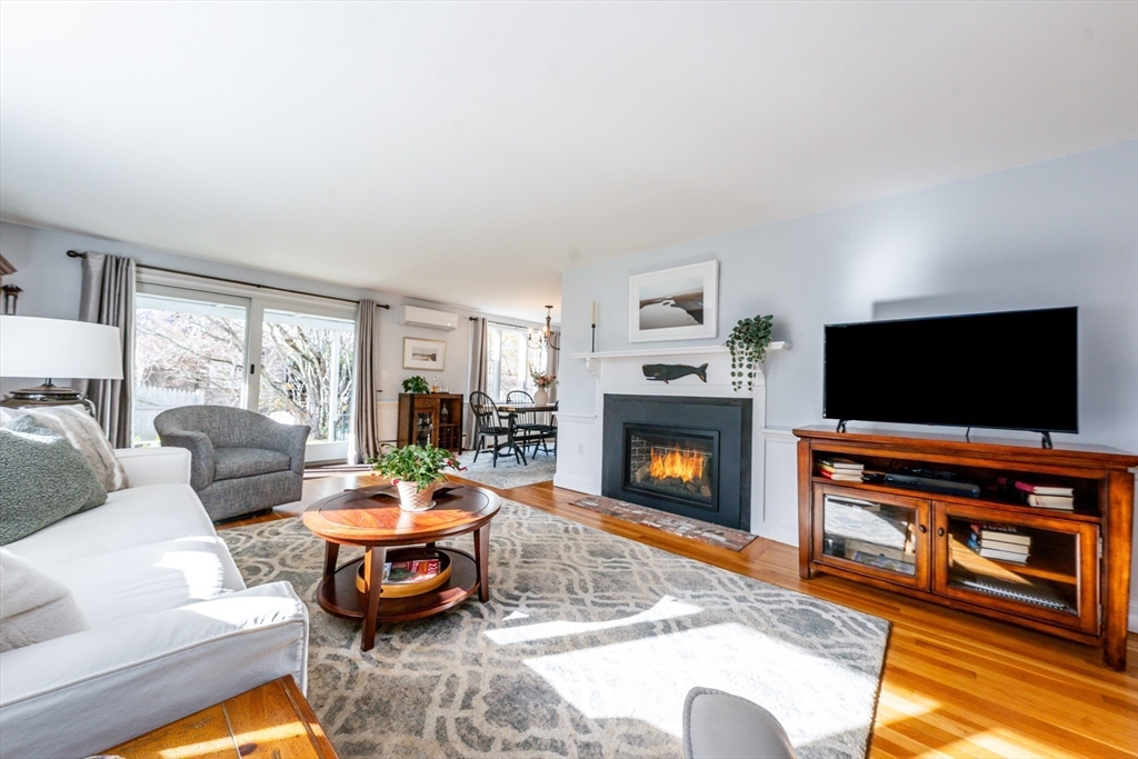 142 Chestnut Street Barnstable, MA 02601 - Photo 3 of 42 a living room with furniture and a flat screen tv
