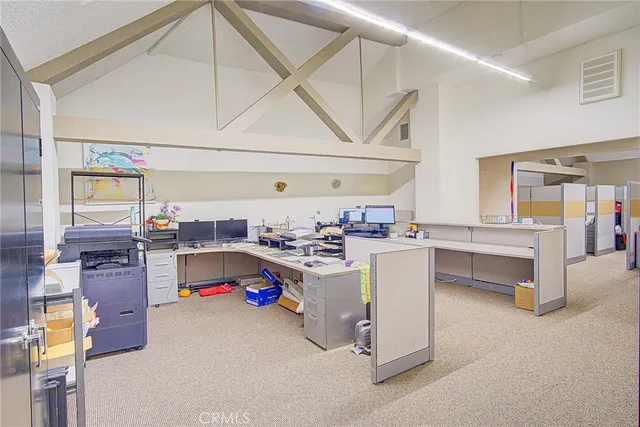 a room with table and chairs