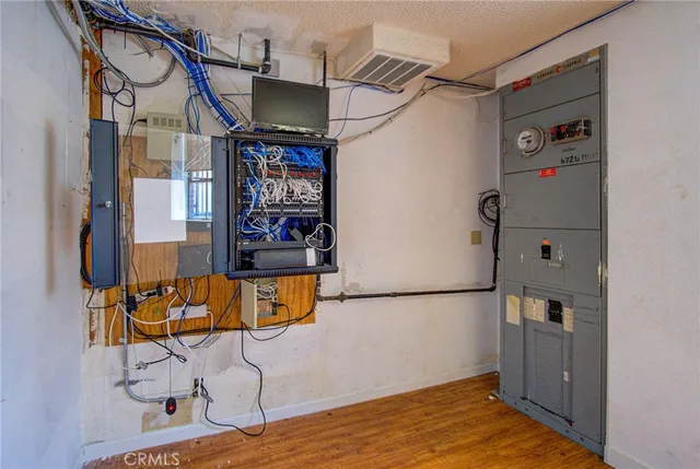 a red car parked in front of a building