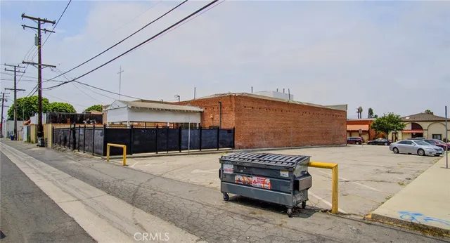 a bathroom with a sink mirror and a toilet