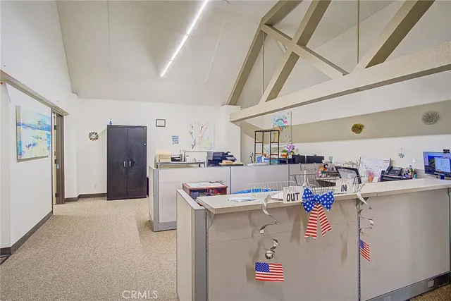 a view of kitchen with cabinets and wooden floor