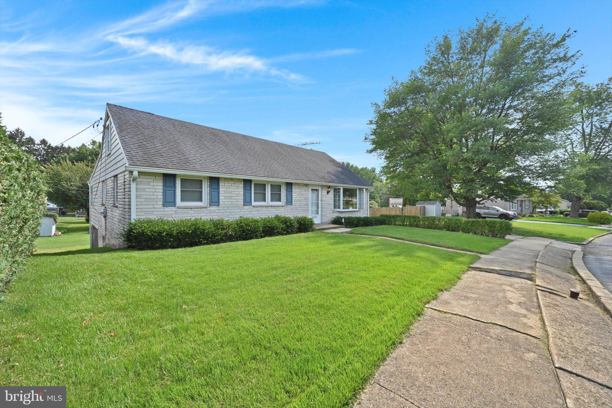 322 Morrison Road Reading, PA 19601 - Photo 1 of 29 a front view of a house with a yard