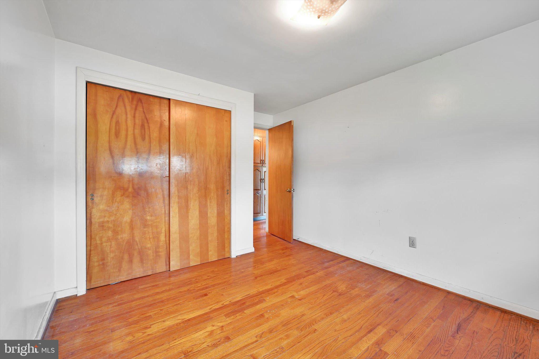 322 Morrison Road Reading, PA 19601 - Photo 12 of 29 a view of empty room with wooden floor