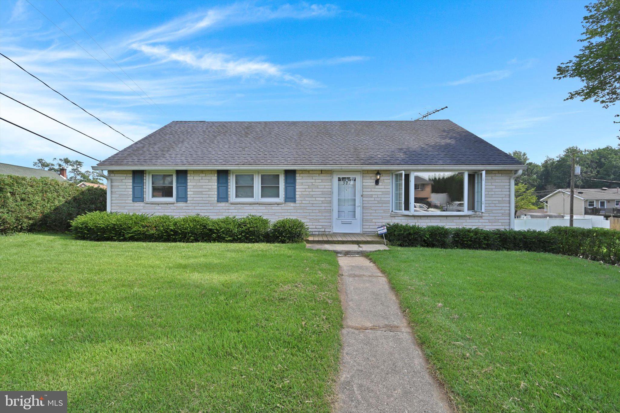 322 Morrison Road Reading, PA 19601 - Photo 2 of 29 a front view of a house with a yard