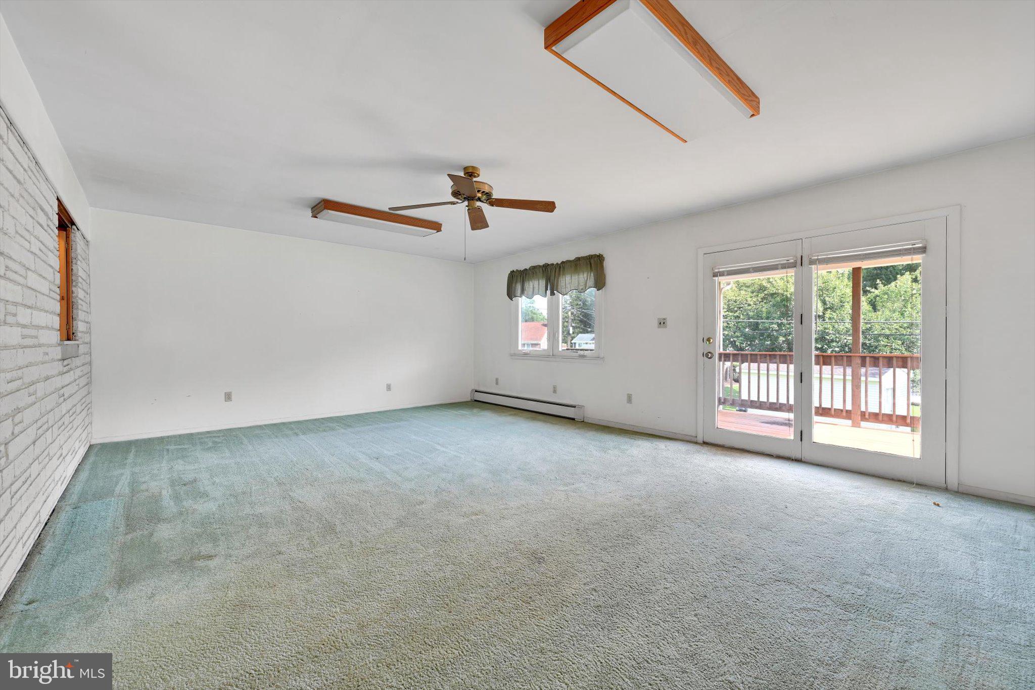 322 Morrison Road Reading, PA 19601 - Photo 9 of 29 a view of a livingroom with a dishwasher and a large window