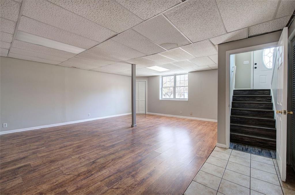 33 Engineer Lane Cartersville, GA 30120 - Photo 34 of 39 a view of an empty room with wooden floor and a window