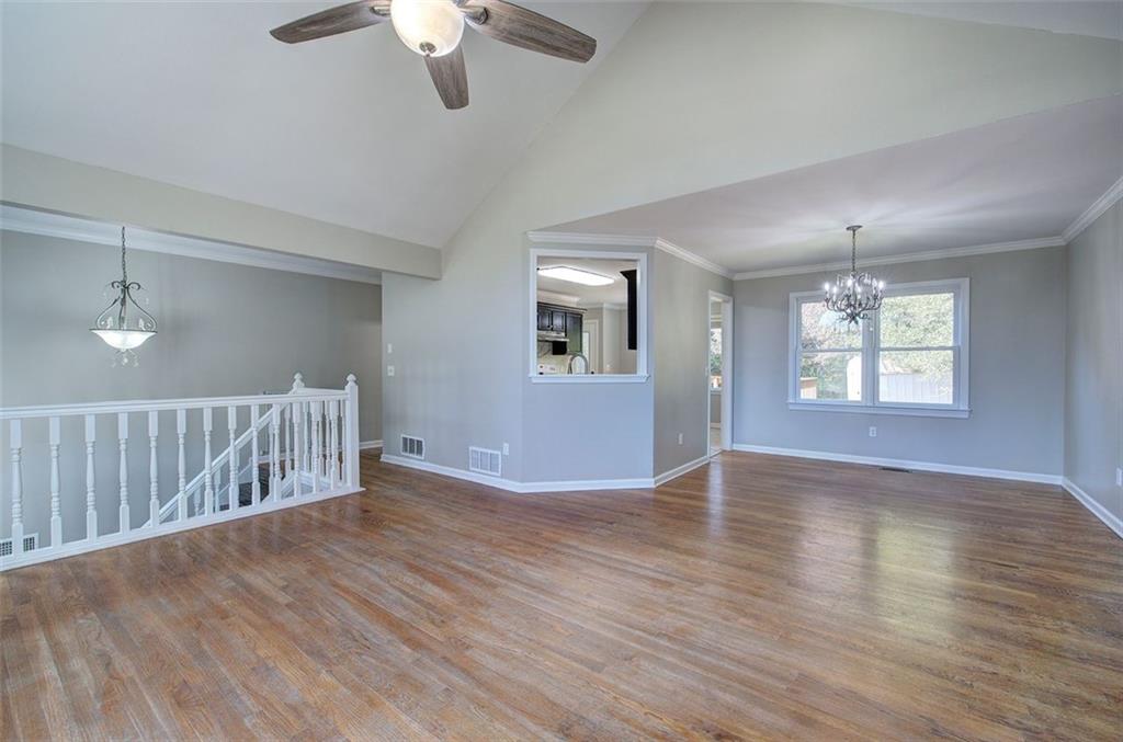 33 Engineer Lane Cartersville, GA 30120 - Photo 9 of 39 a view of an empty room with wooden floor and a window