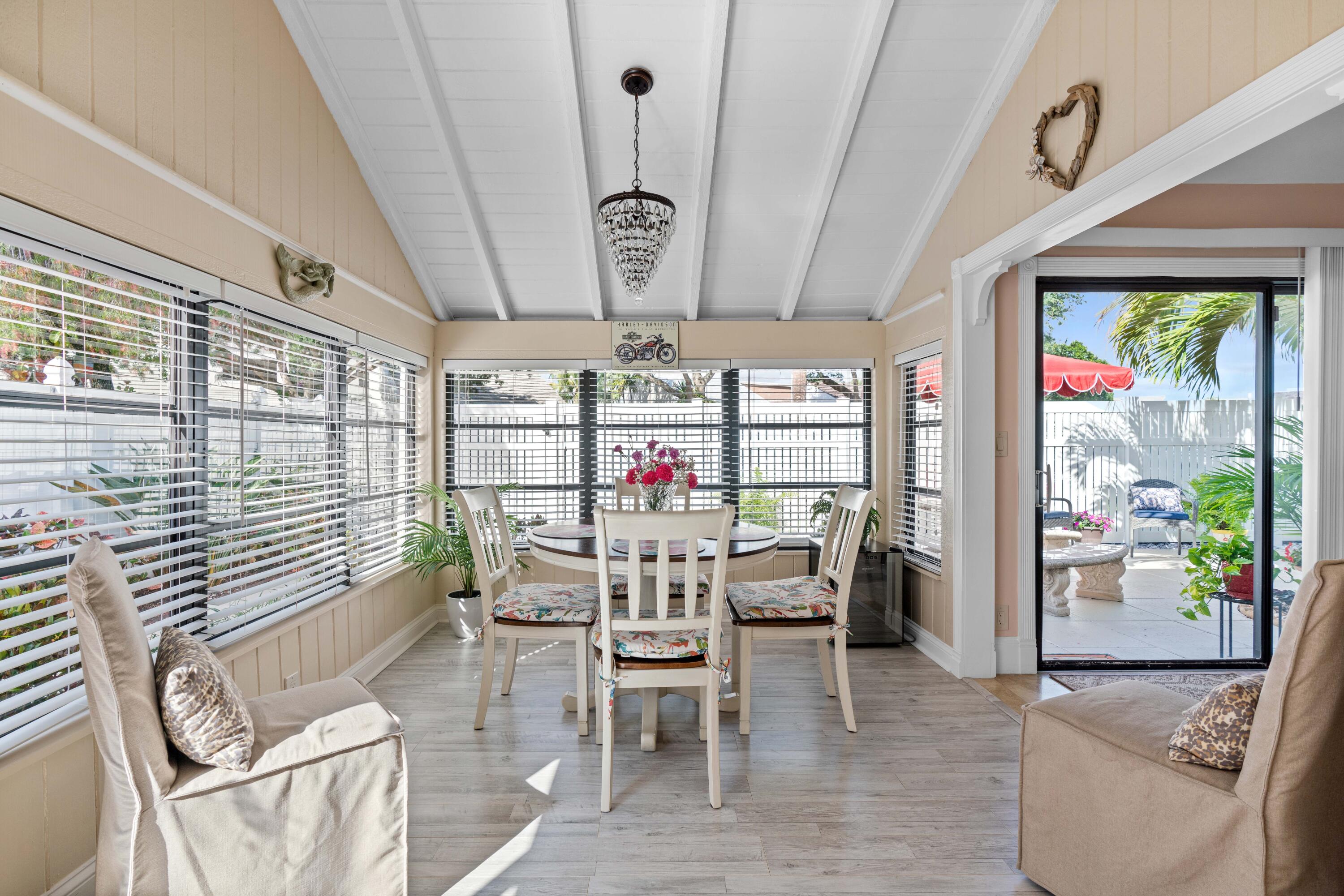17023 Traverse Circle Jupiter, FL 33477 - Photo 14 of 35 a view of a dining room with furniture window and outside view