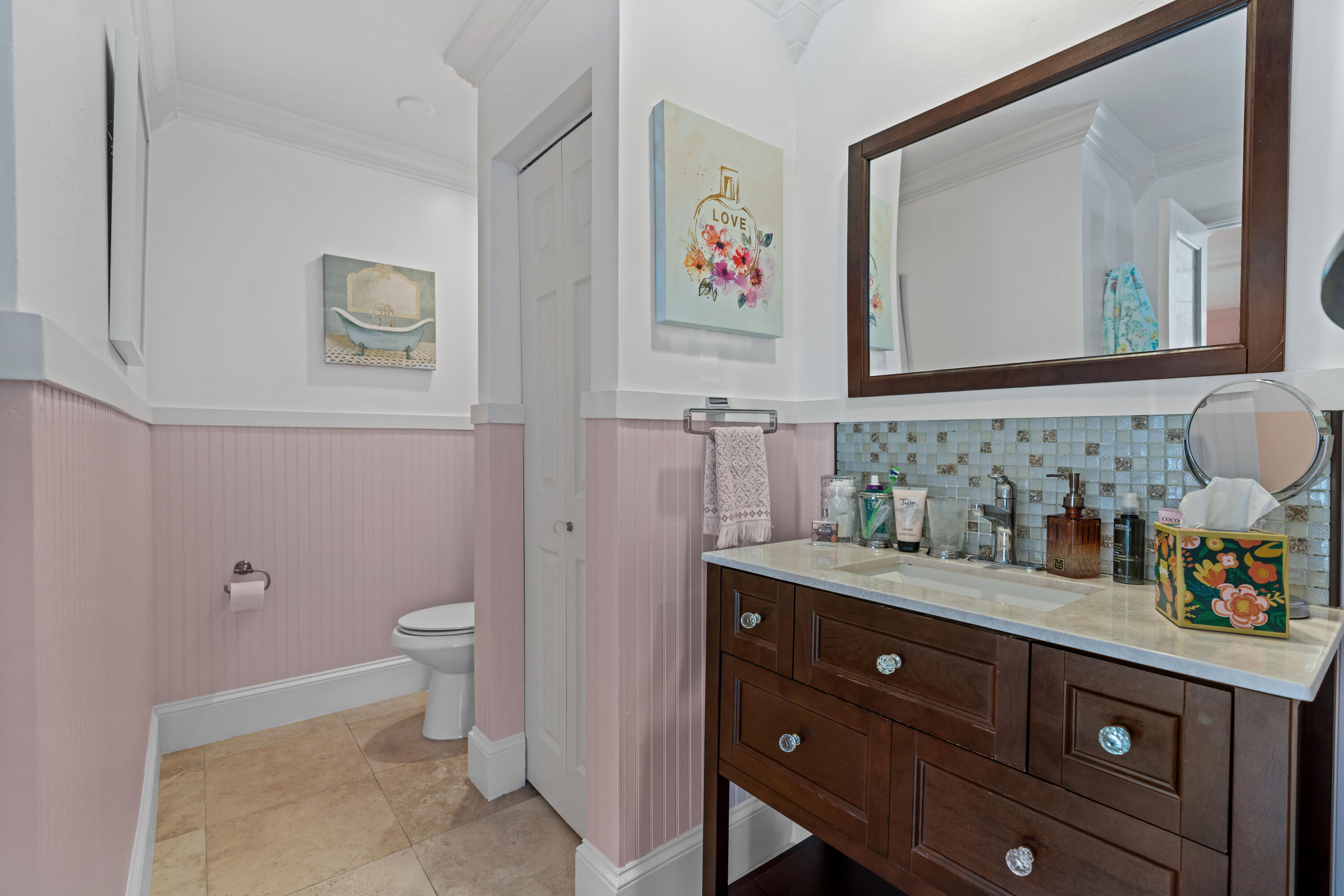 17023 Traverse Circle Jupiter, FL 33477 - Photo 18 of 35 a bathroom with a granite countertop sink mirror vanity and toilet