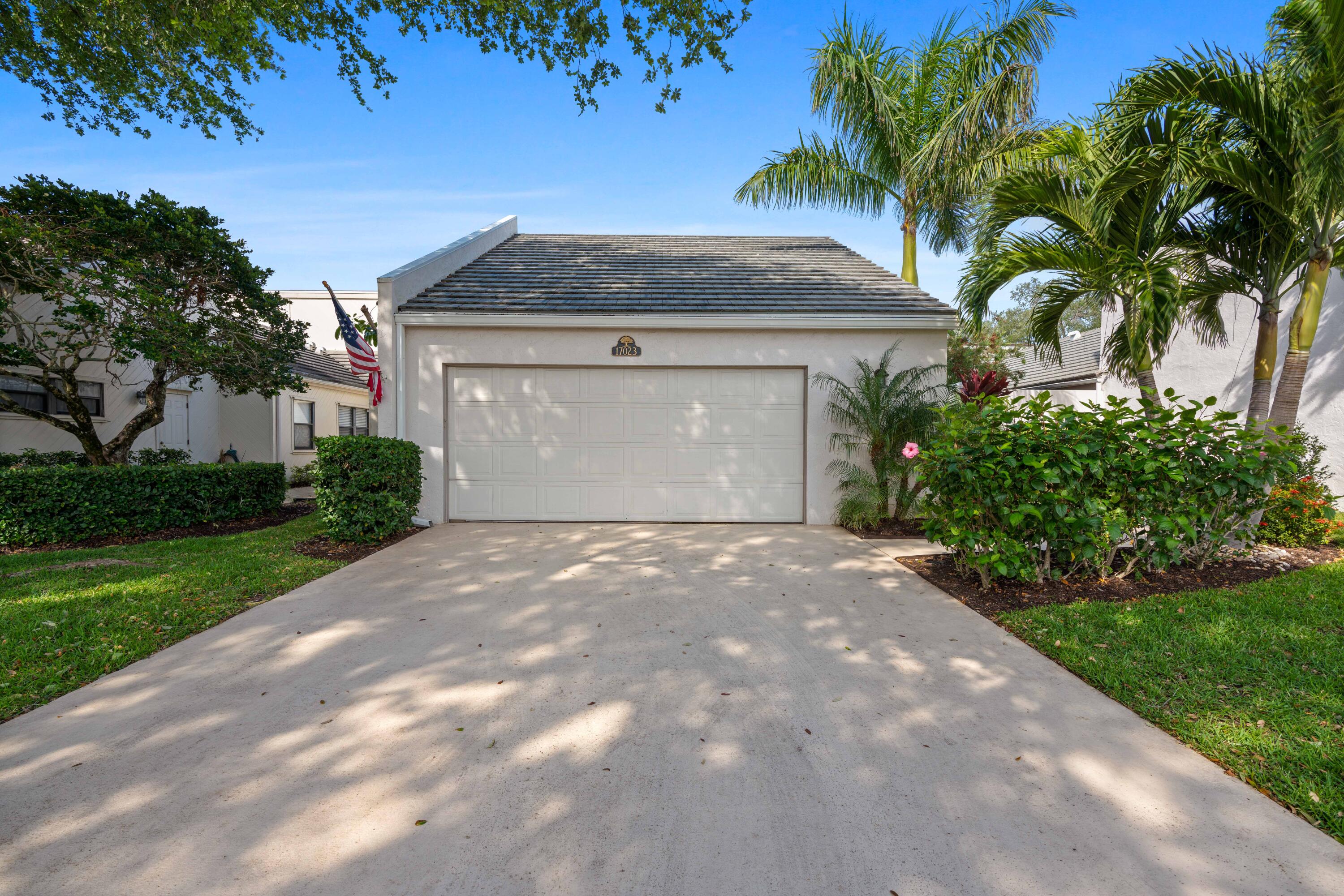 17023 Traverse Circle Jupiter, FL 33477 - Photo 35 of 35 a view of a house with a yard