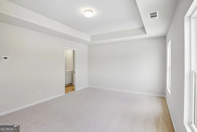 an empty room with an entryway
