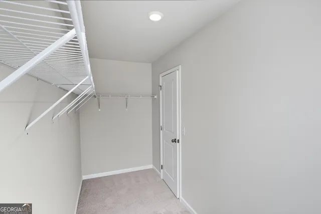 a view of hallway with stairs