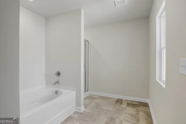 a bathroom with a bathtub