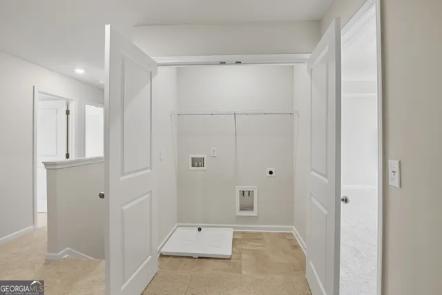 a view of a bathroom with a glass door shower