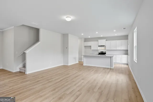 a view of kitchen with wooden floor
