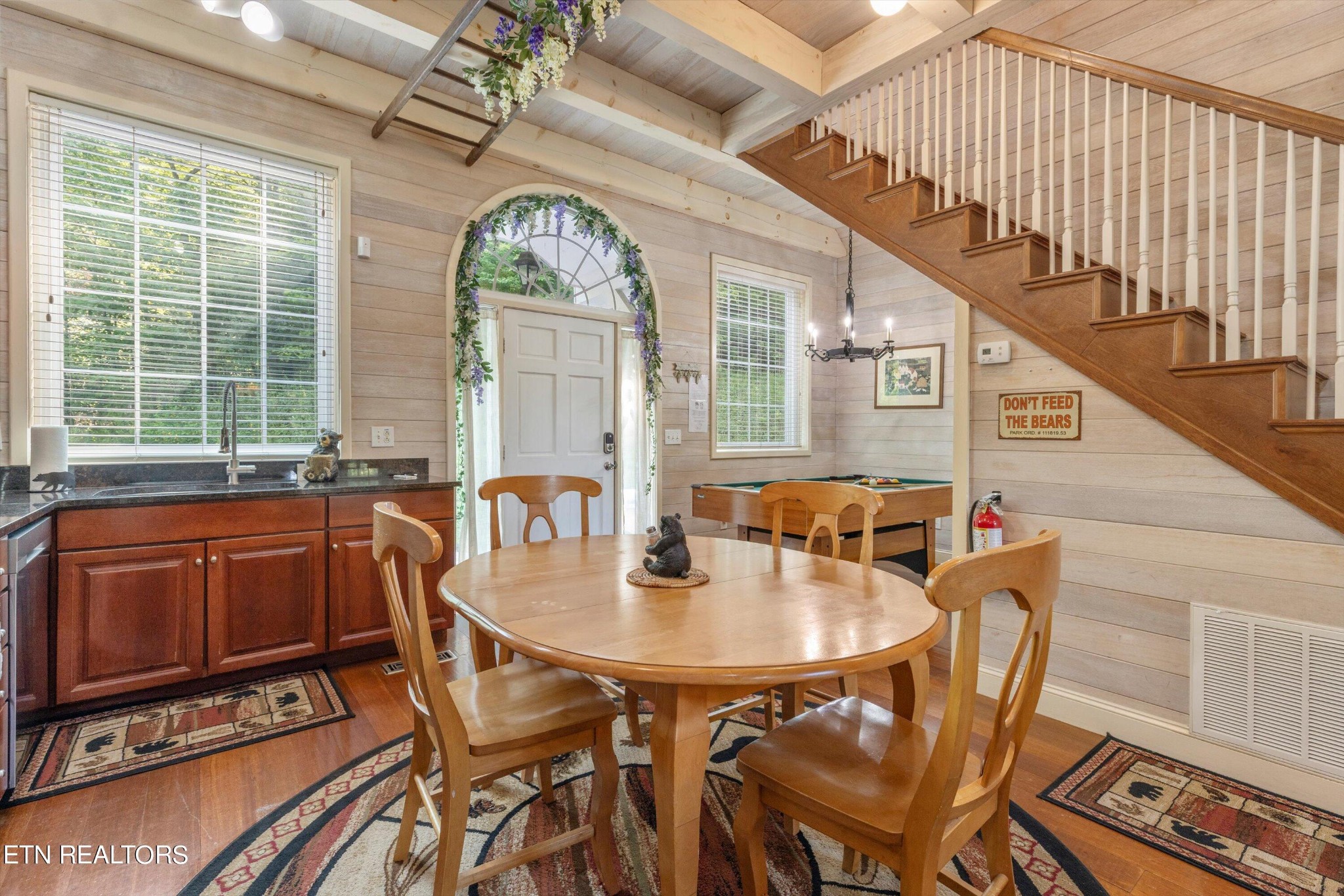 3638 Locust Ridge Road Sevierville, TN 37876 - Photo 15 of 50 a dining room with furniture window and wooden floor