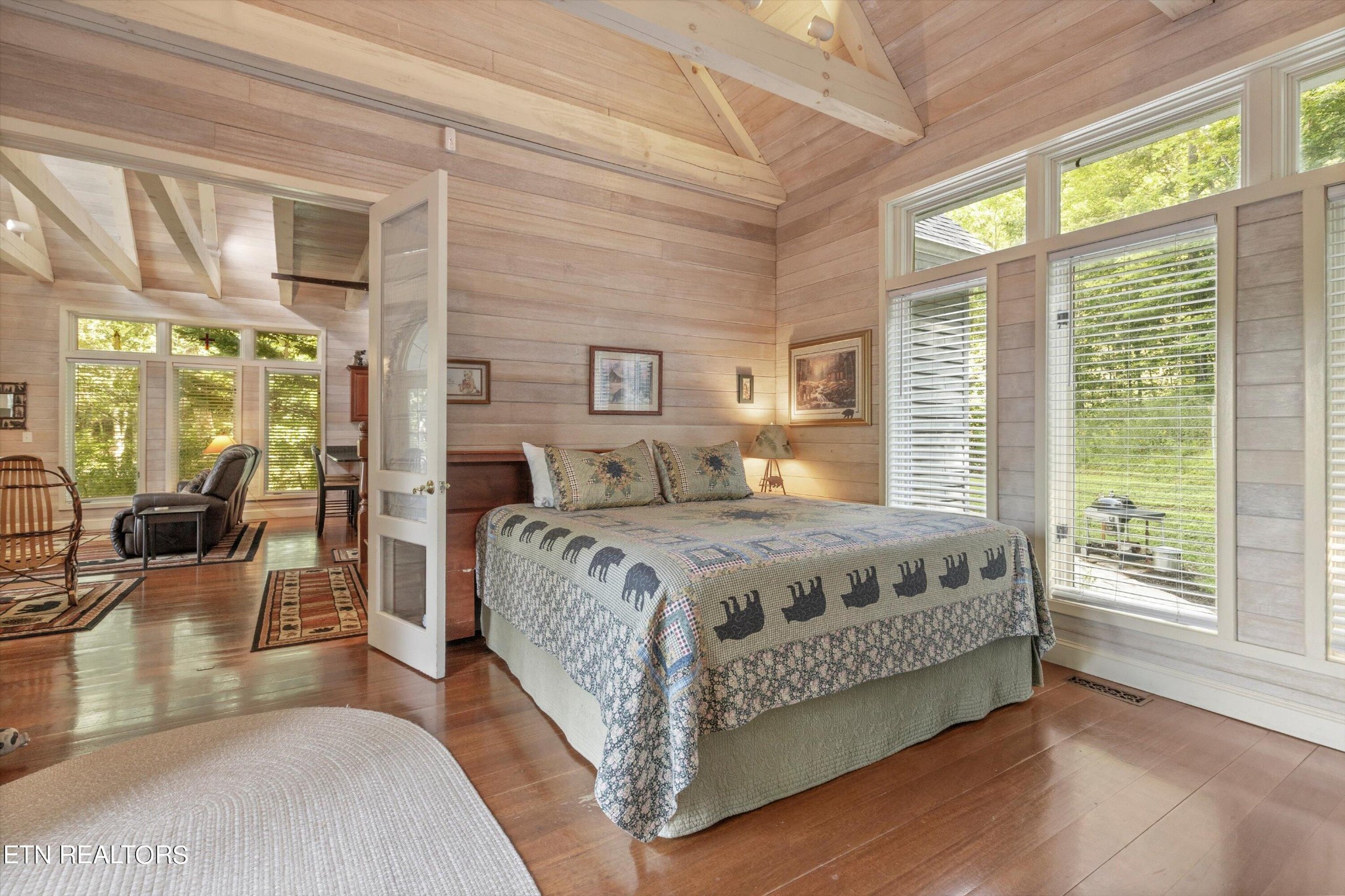 3638 Locust Ridge Road Sevierville, TN 37876 - Photo 24 of 50 a bedroom with a large bed and a large window