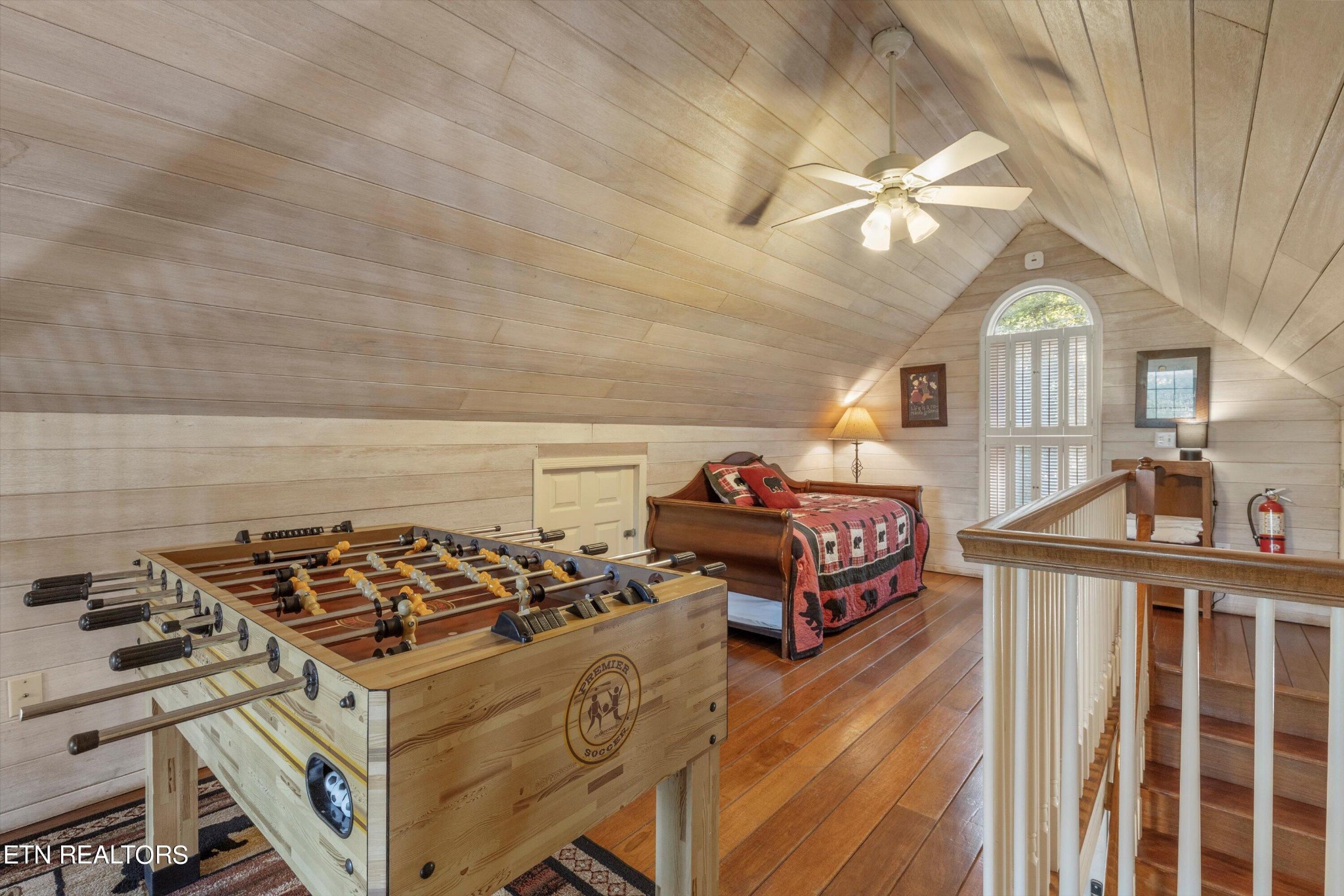 3638 Locust Ridge Road Sevierville, TN 37876 - Photo 30 of 50 a bedroom with furniture and a window