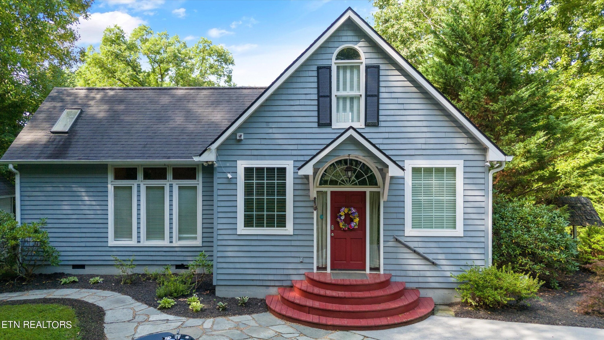 3638 Locust Ridge Road Sevierville, TN 37876 - Photo 6 of 50 a front view of a house with a yard