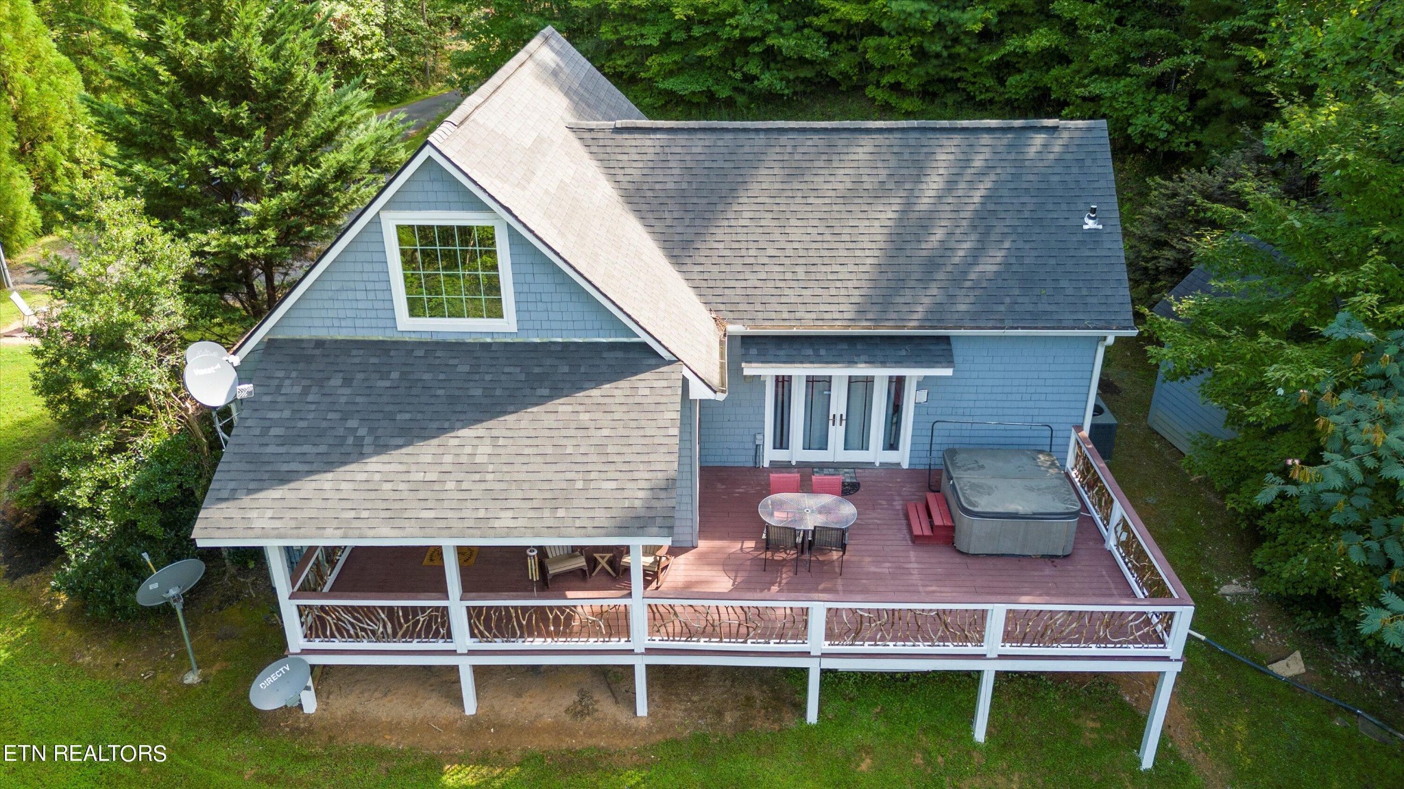 3638 Locust Ridge Road Sevierville, TN 37876 - Photo 9 of 50 a view of a house with roof deck