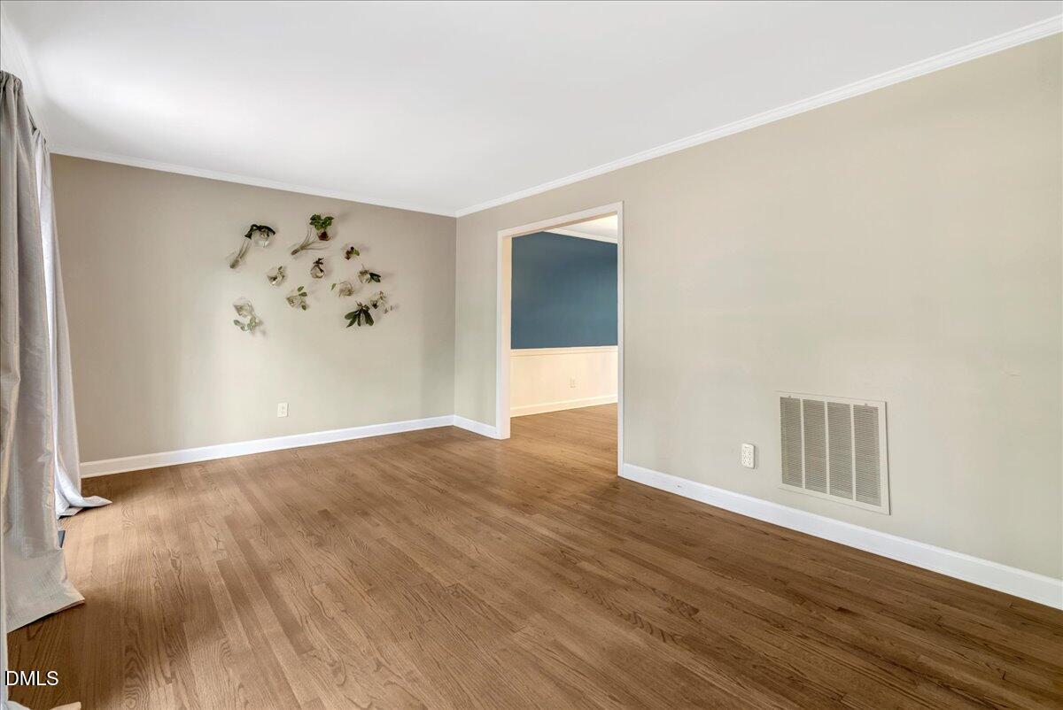 11808 Edgewater Court Raleigh, NC 27614 - Photo 13 of 56 wooden floor in an empty room
