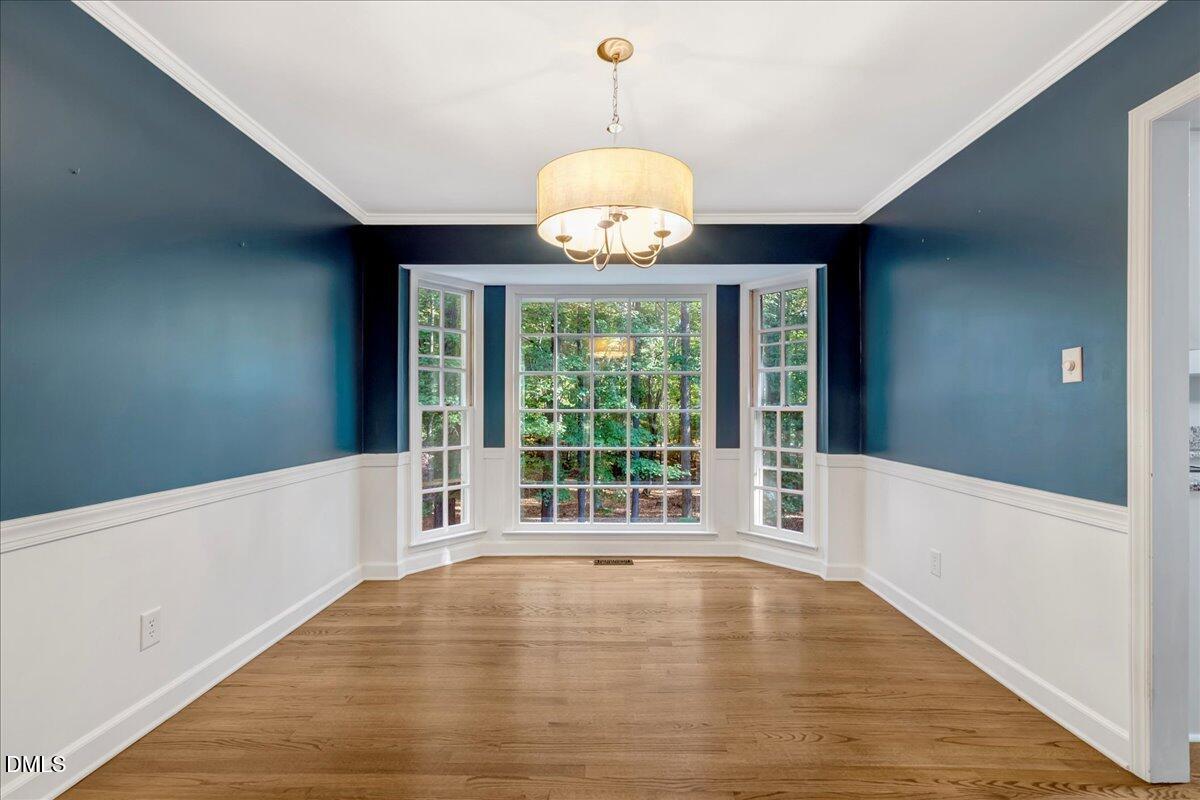 11808 Edgewater Court Raleigh, NC 27614 - Photo 15 of 56 a view of an empty room with a window
