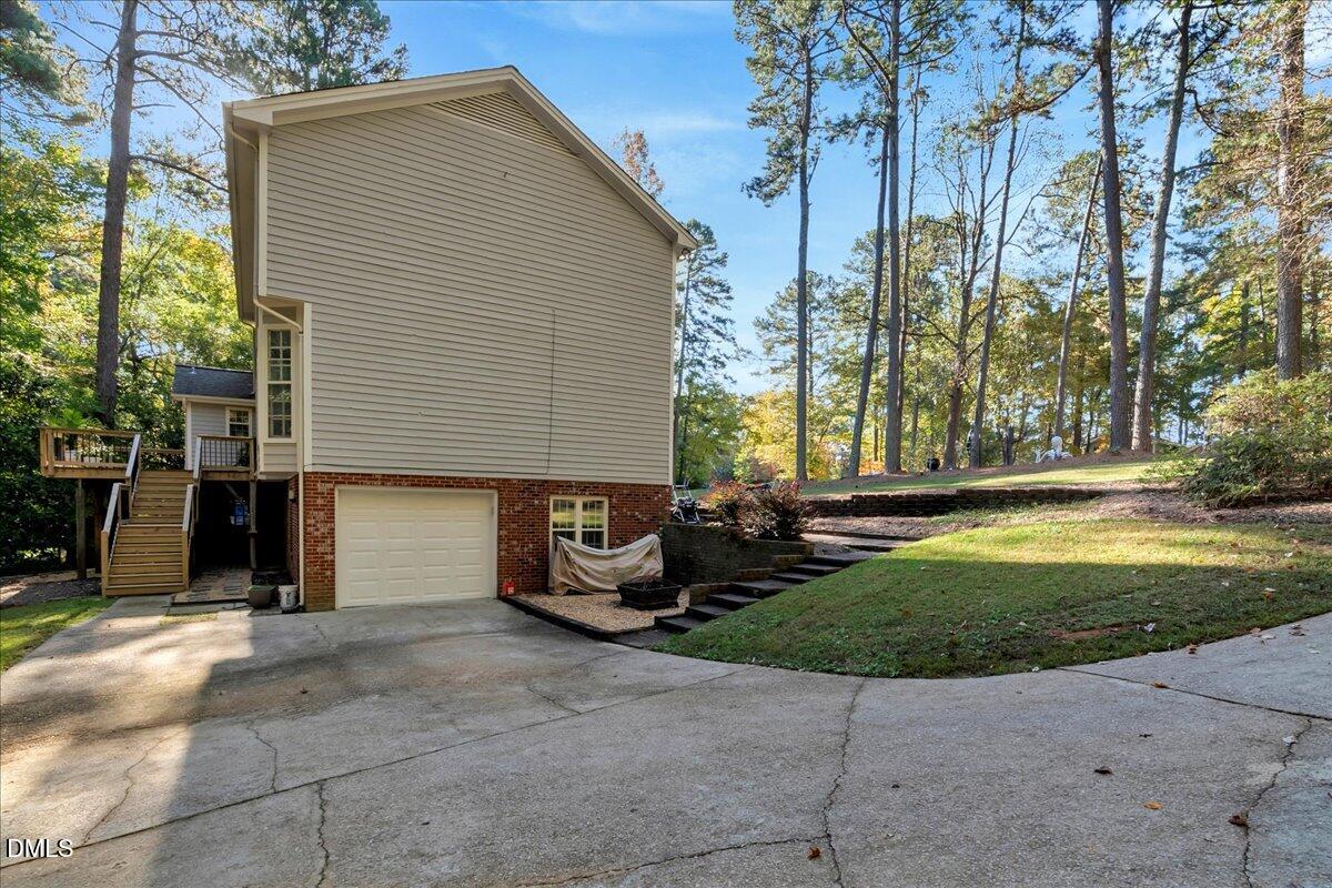11808 Edgewater Court Raleigh, NC 27614 - Photo 25 of 56 a view of a house with backyard and sitting area