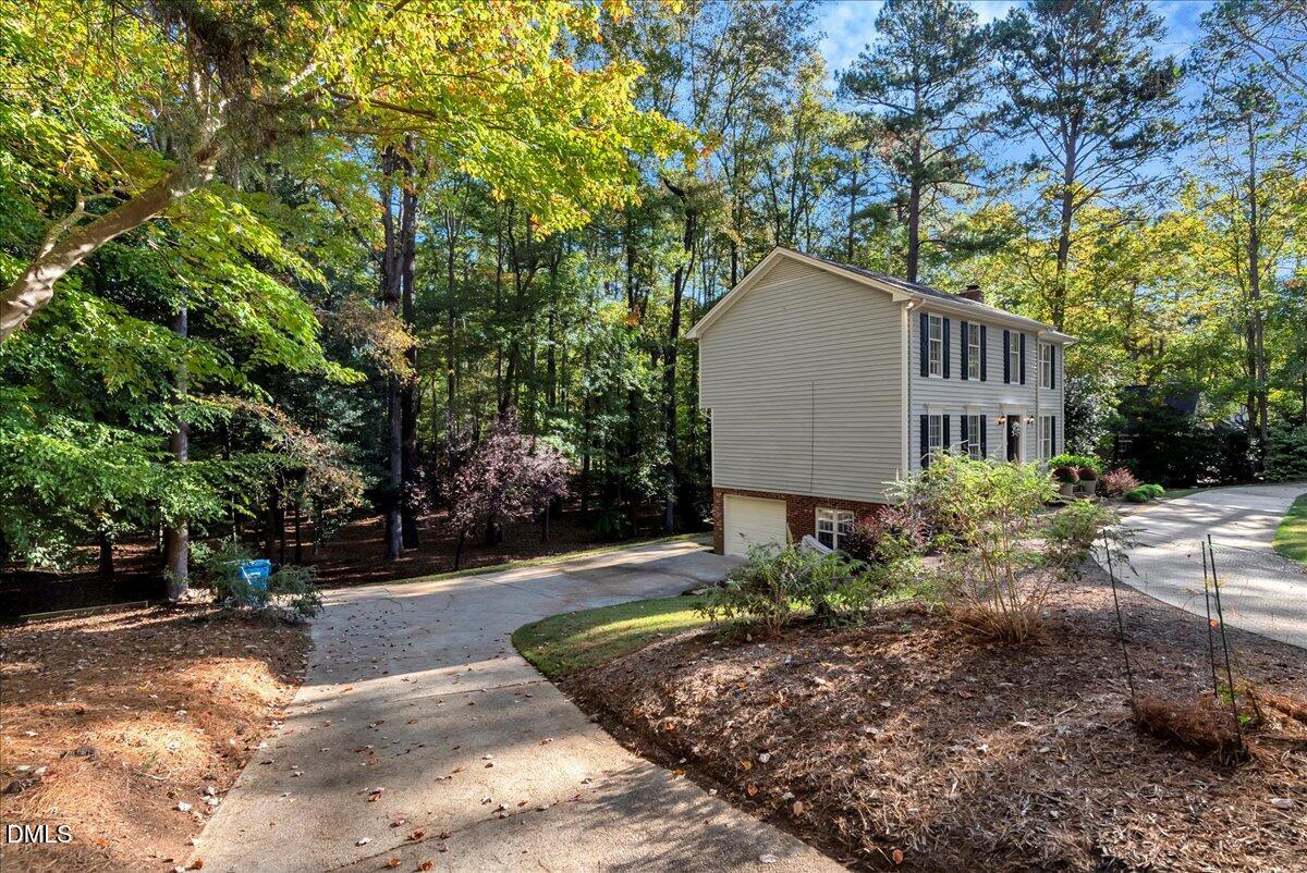 11808 Edgewater Court Raleigh, NC 27614 - Photo 26 of 56 a view of a house with yard and large trees