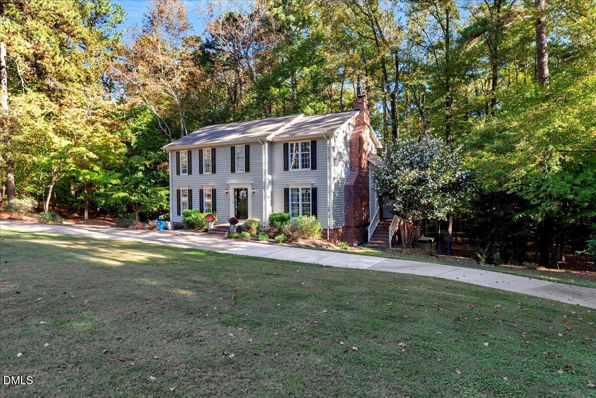 11808 Edgewater Court Raleigh, NC 27614 - Photo 32 of 56 a view of a house with a yard