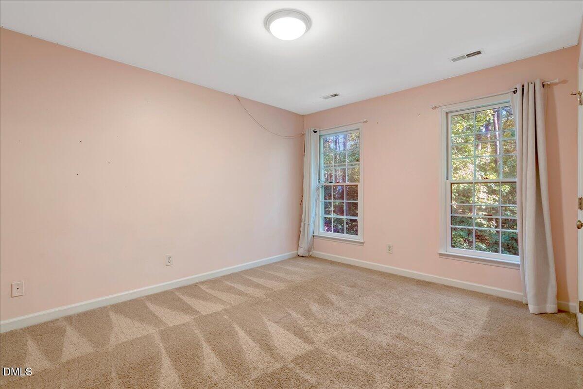11808 Edgewater Court Raleigh, NC 27614 - Photo 35 of 56 an empty room with windows