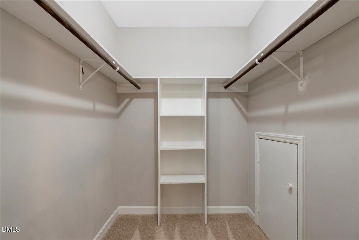 11808 Edgewater Court Raleigh, NC 27614 - Photo 40 of 56 a view of an empty walk in closet