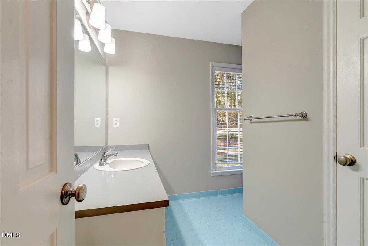 11808 Edgewater Court Raleigh, NC 27614 - Photo 46 of 56 a room with pool table and windows