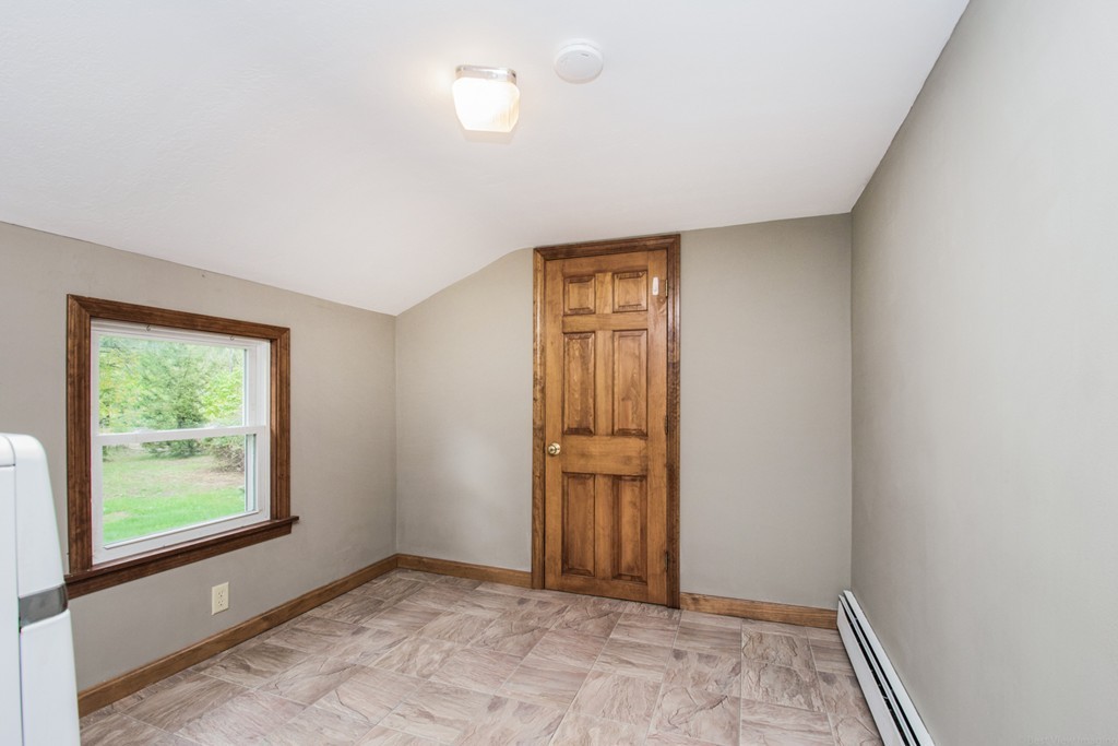 654 North Brookfield Road Oakham, MA 01068 - Photo 18 of 28 an empty room with windows