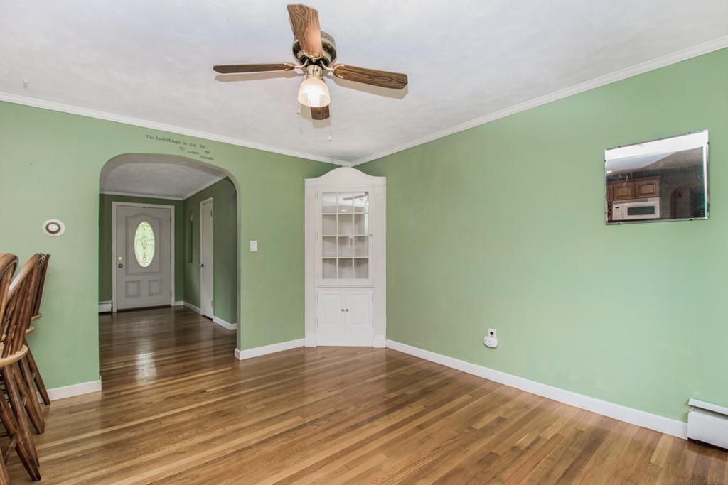 654 North Brookfield Road Oakham, MA 01068 - Photo 8 of 28 a view of room with window and wooden floor