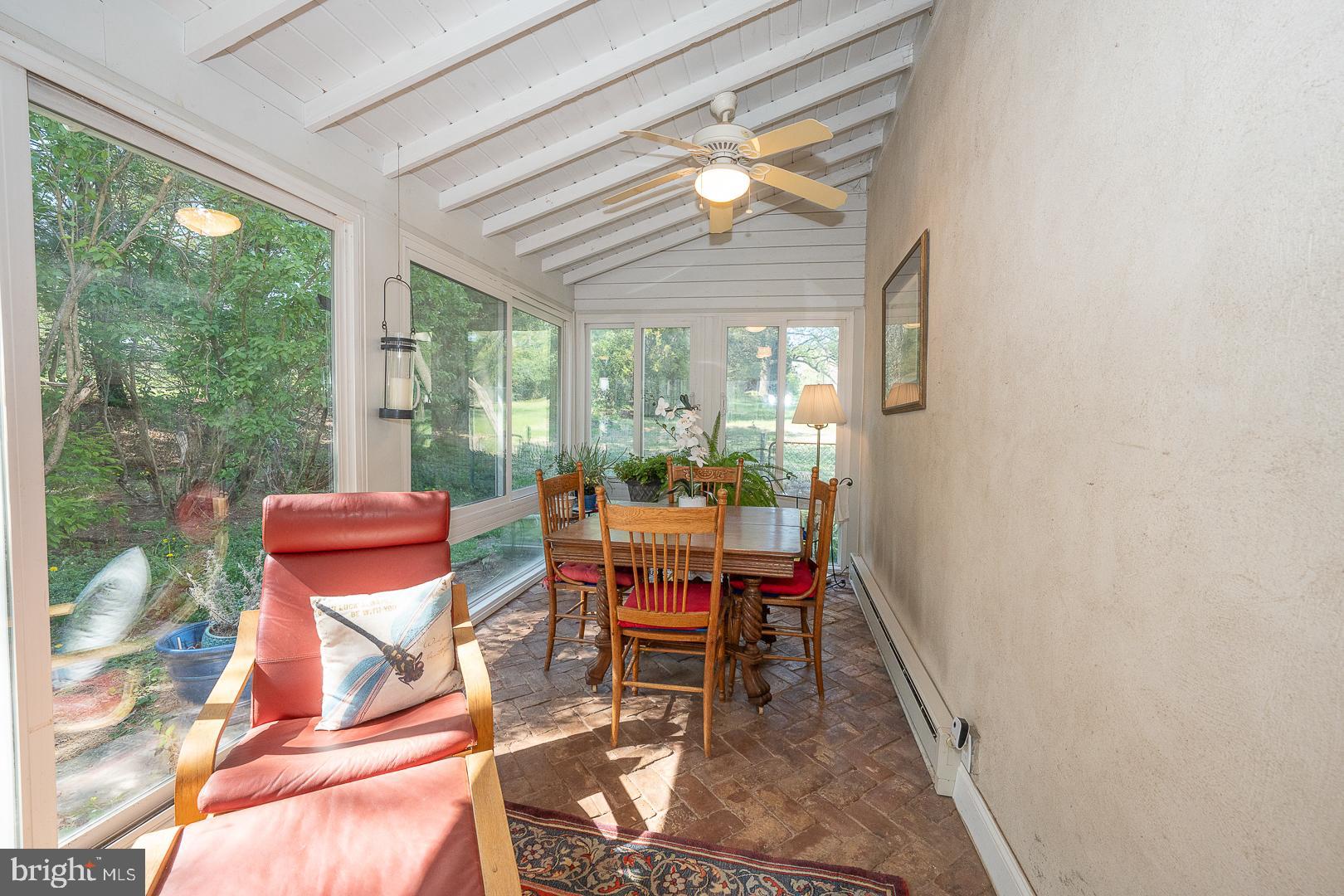 526 Egypt Road Phoenixville, PA 19460 - Photo 12 of 64 a dining room with furniture and a floor to ceiling window