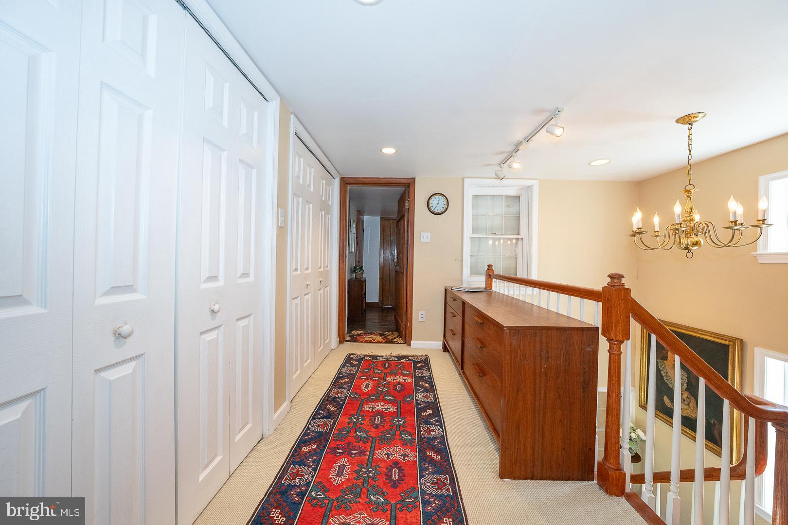 526 Egypt Road Phoenixville, PA 19460 - Photo 15 of 64 a view of a hallway with wooden floor and staircase