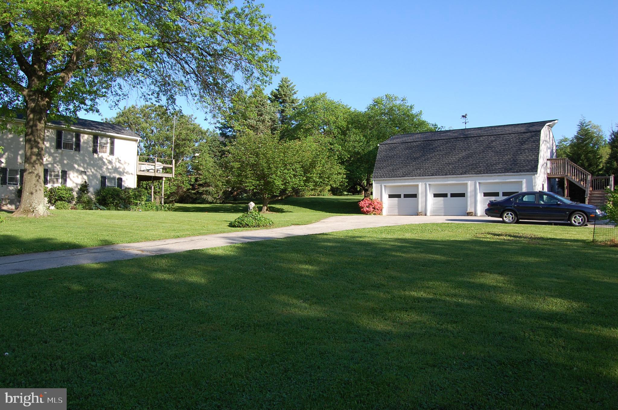 526 Egypt Road Phoenixville, PA 19460 - Photo 2 of 64 a front view of a house with yard and green space