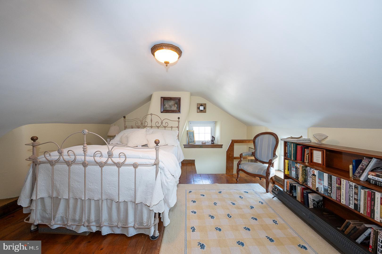 526 Egypt Road Phoenixville, PA 19460 - Photo 21 of 64 a bedroom with furniture and a book shelf