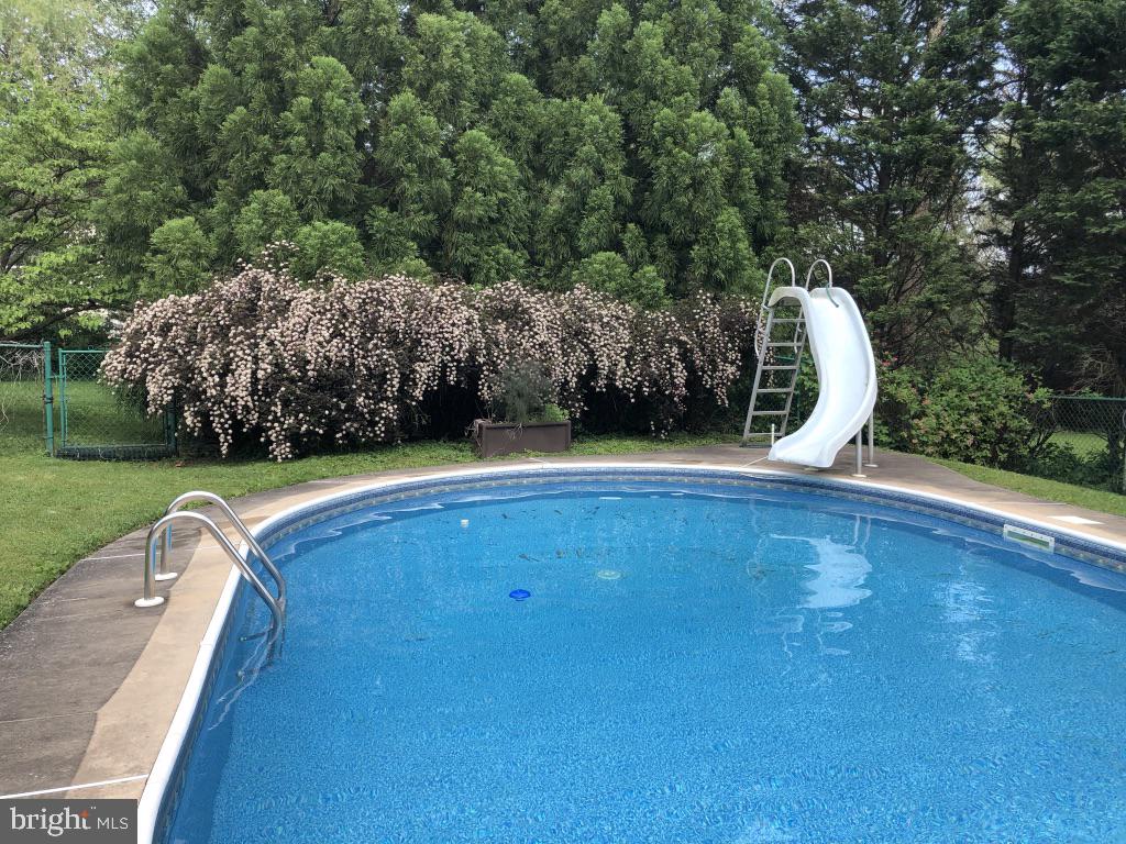 526 Egypt Road Phoenixville, PA 19460 - Photo 3 of 64 a view of a swimming pool with a garden