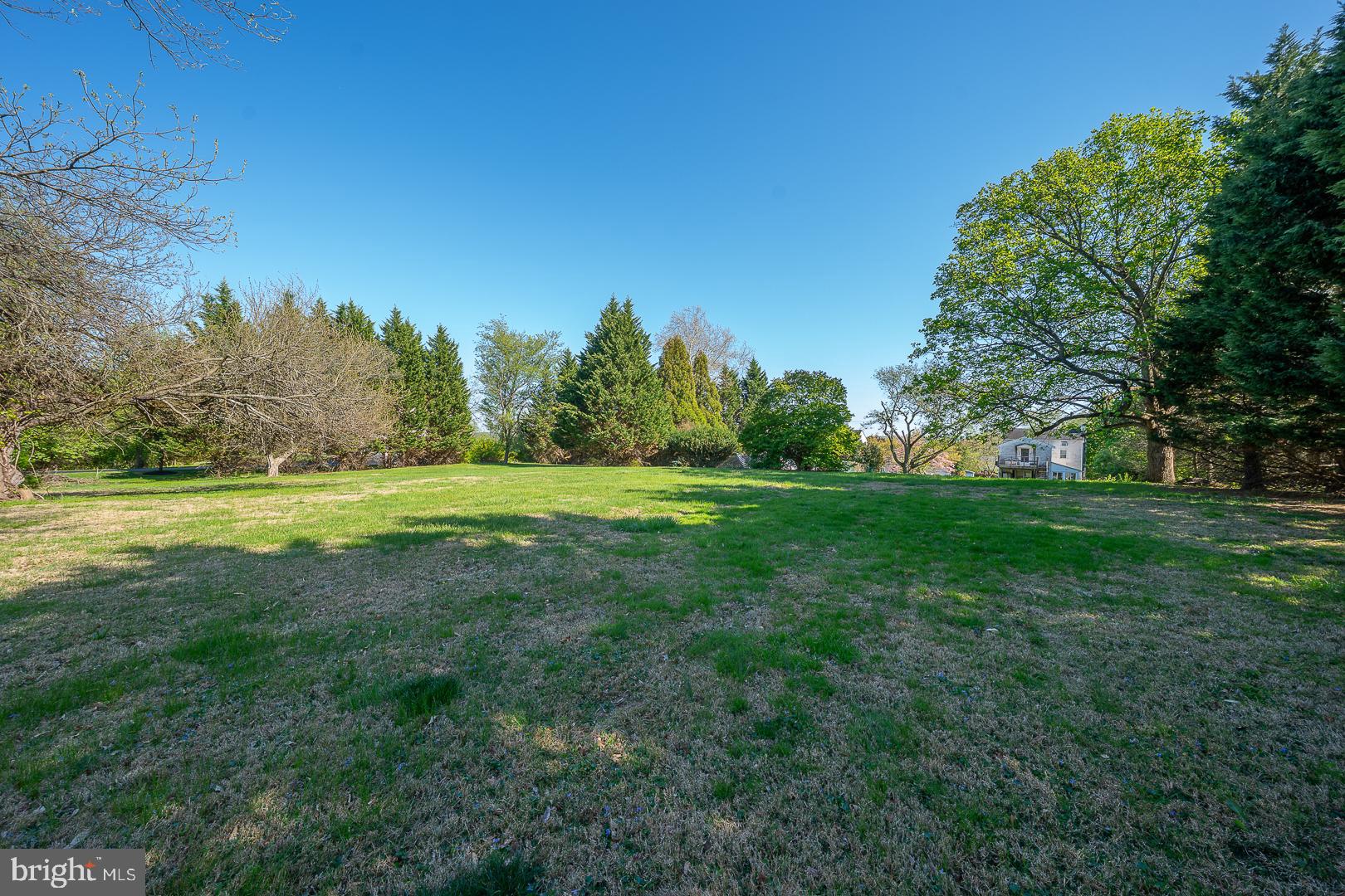 526 Egypt Road Phoenixville, PA 19460 - Photo 57 of 64 a view of a grassy field with trees in the background